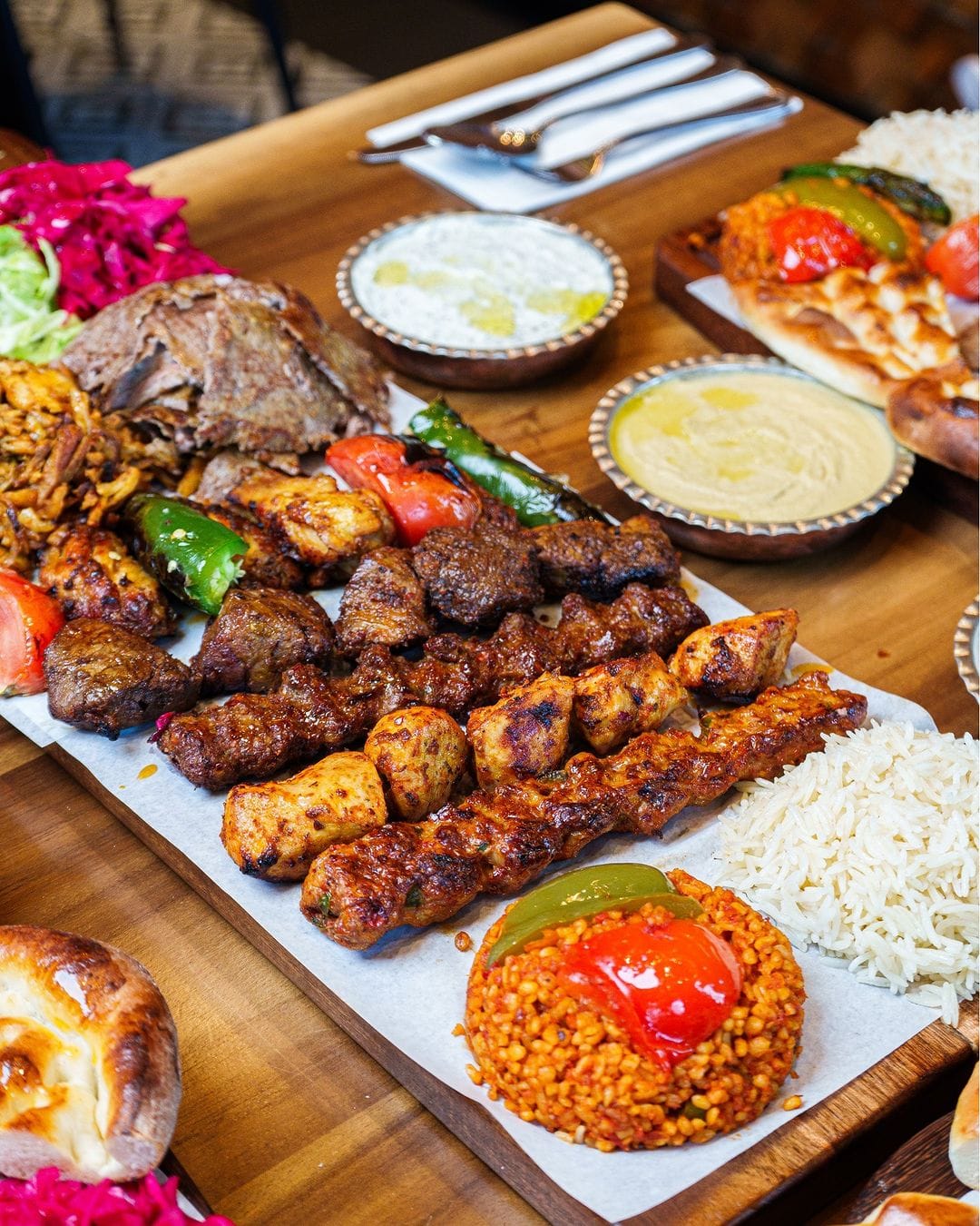 Turkish mixed grill platter with assorted kebabs, rice and grilled vegetables at Taste of Istanbul Dubai